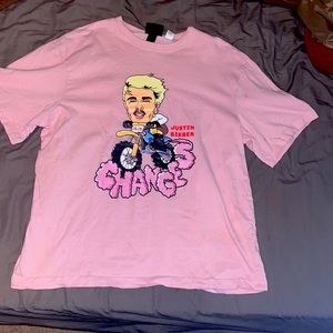 This is a pink Justin Bieber t, heavier material,medium but fits more of a large